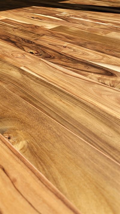 Close-up of hickory hardwood plank flooring with natural color variation